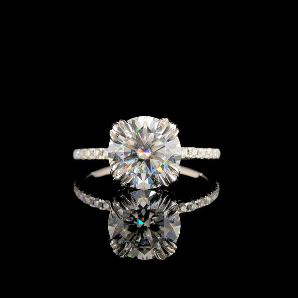 Rose gold Radiant Brilliant Solitaire with Pavé Band and Claw Prong Setting