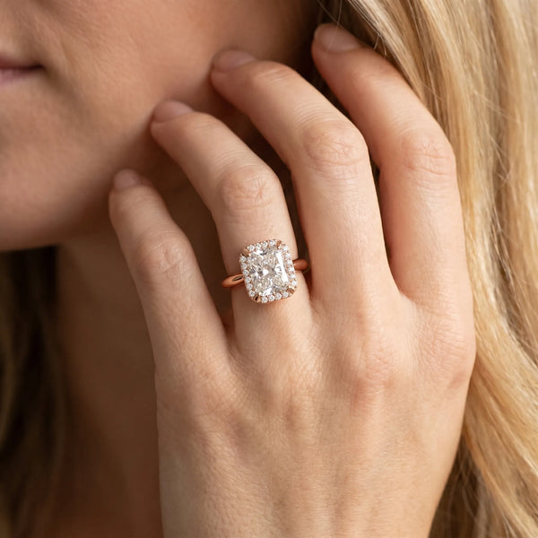 Rose gold Radiant Cut Diamond Halo Engagement Ring with Split Shank and Four-Prong Setting
