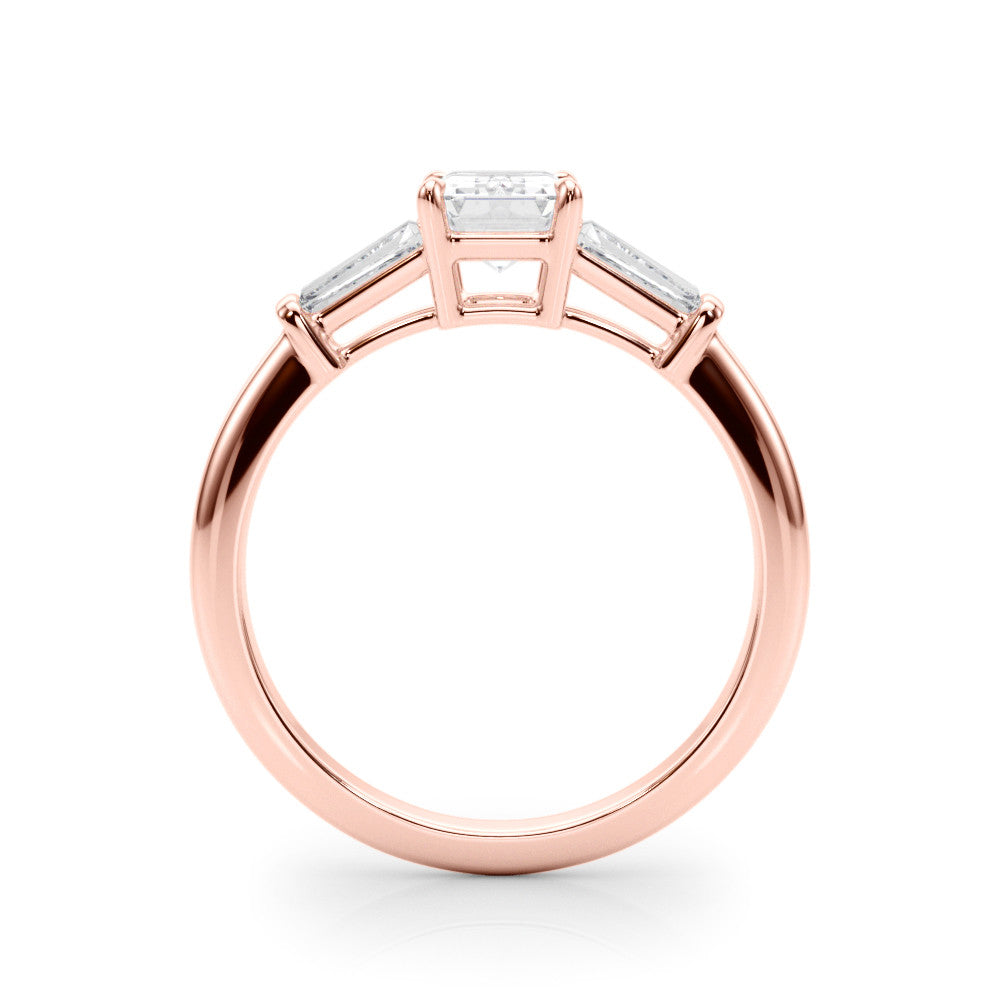 Rose gold Radiant Cut Diamond Ring with Tapered Baguette Side Stones on a Platinum Band with Four-Prong Setting