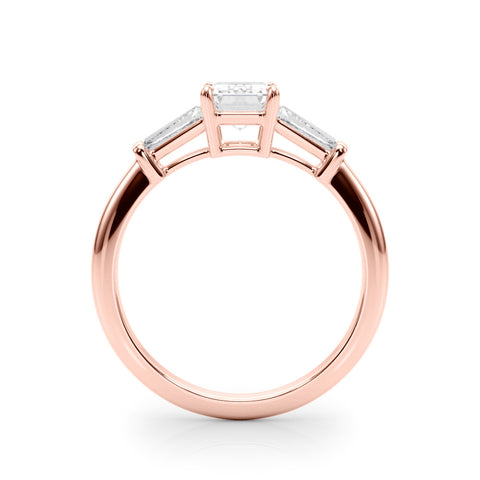Rose gold Radiant Cut Diamond Ring with Tapered Baguette Side Stones on a Platinum Band with Four-Prong Setting