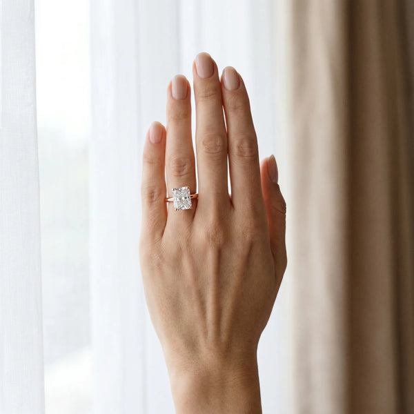Rose gold Radiant Cut Diamond Solitaire Engagement Ring with Round Band and Four-Prong Setting