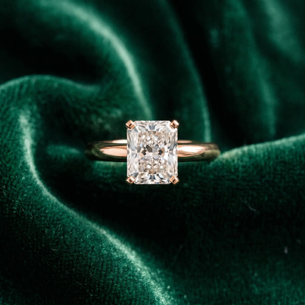 Rose gold Radiant Cut Diamond Solitaire Engagement Ring with Round Band and Four-Prong Setting