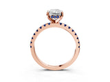 Rose gold Radiant Cut Diamond Solitaire Ring with Round with Blue Sapphire side stone Pavé Band and Four-Prong Setting_39