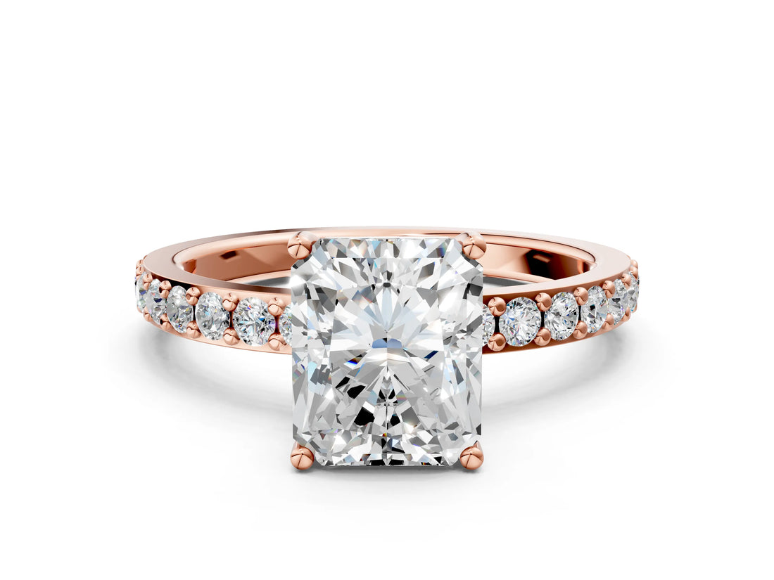 Rose gold Radiant Cut Diamond Solitaire with Pave Band and Four-Prong Setting
