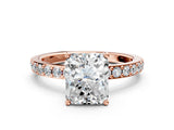 Rose gold Radiant Cut Diamond Solitaire with Pave Band and Four-Prong Setting