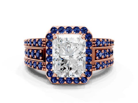 Rose gold Radiant Cut Halo Diamond Ring with Round with Blue Sapphire side stone Split Shank and Prong Setting