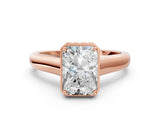 Rose gold Radiant Cut Solitaire Diamond Engagement Ring with Four-Prong Setting and Tapered Band_3