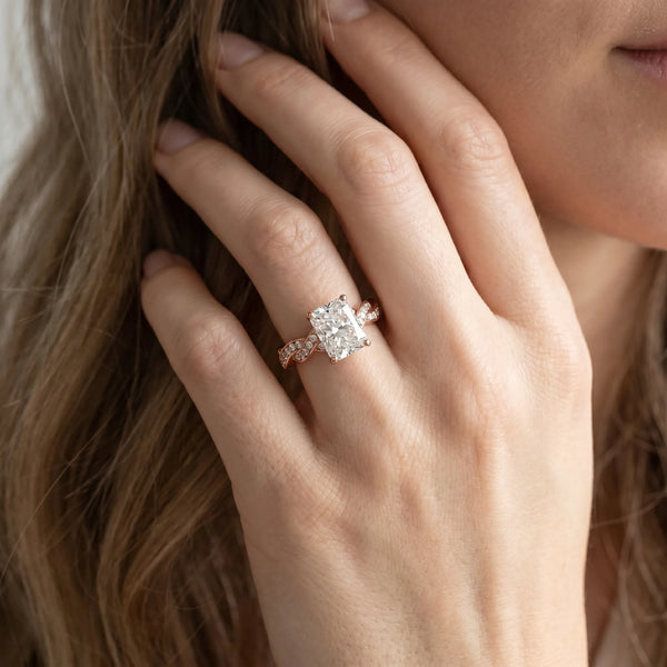 Rose gold Radiant Cut Twisted Pavé Band Solitaire Ring with Four-Prong Setting