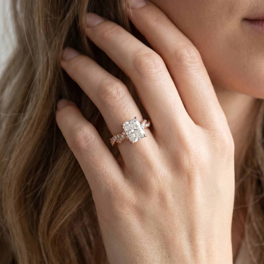 Rose gold Radiant Cut Twisted Pavé Band Solitaire Ring with Four-Prong Setting