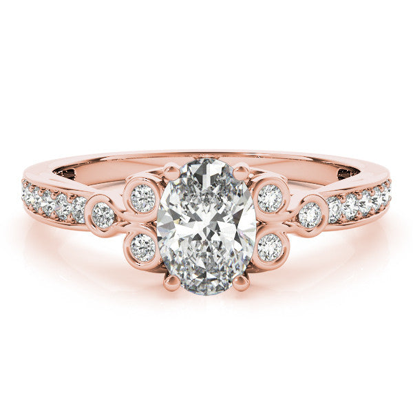 Rose gold Pear Diamond Bezel and Prong Setting with Pave Band