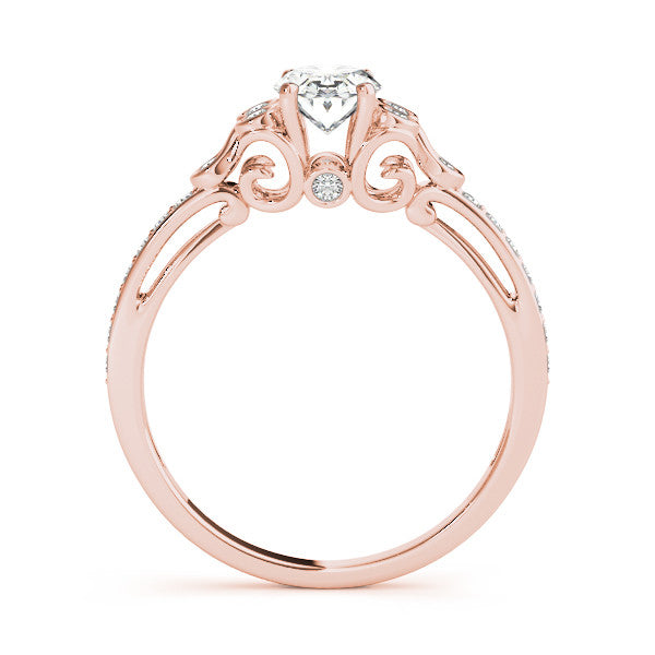 Rose gold Pear Diamond Bezel and Prong Setting with Pave Band