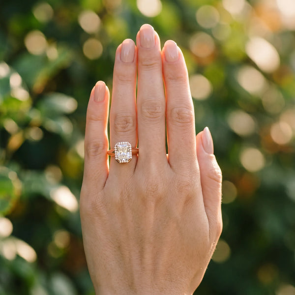 Rose gold Radiant Halo Diamond Ring with Cathedral Band and Four-Prong Setting