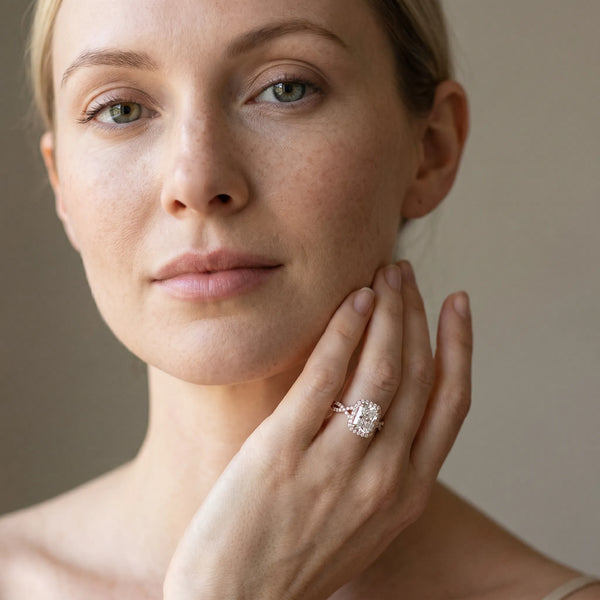 Rose gold Radiant Halo Twist Band with Four-Prong Setting