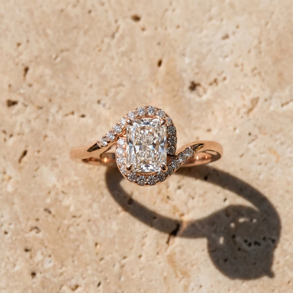 Rose gold Radiant Halo Twist Band with Four-Prong Setting