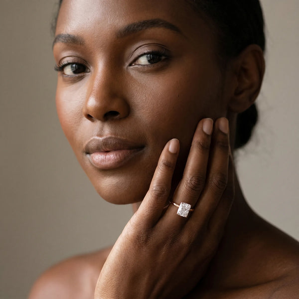 Rose gold Radiant Solitaire Diamond Engagement Ring with Four-Prong Setting on a Classic Band