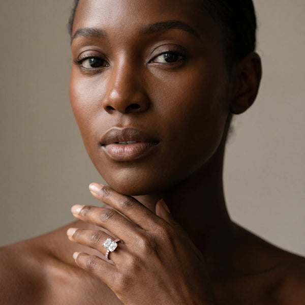 Rose gold Radiant Solitaire Diamond Engagement Ring with Pavé Band and Six-Prong Setting