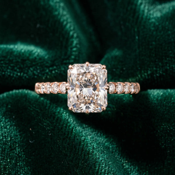 Rose gold Radiant Solitaire Diamond Engagement Ring with Pavé Band and Six-Prong Setting