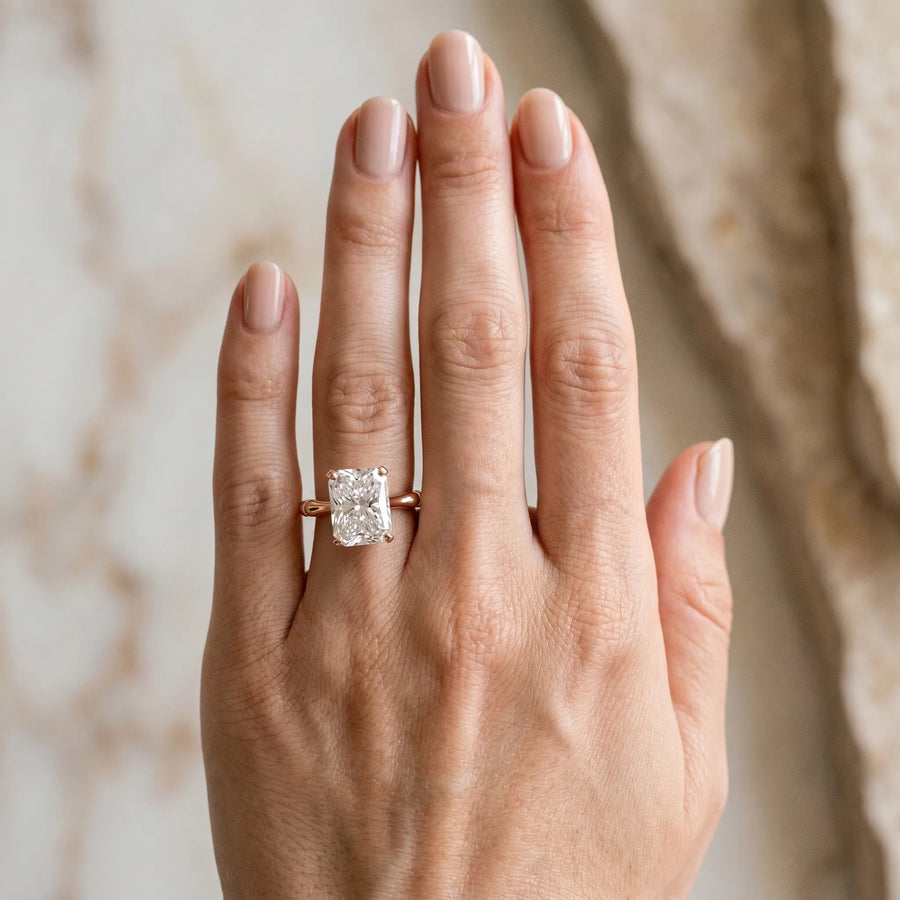 Rose gold Radiant Solitaire Diamond Ring with Bamboo Band and Four-Prong Setting