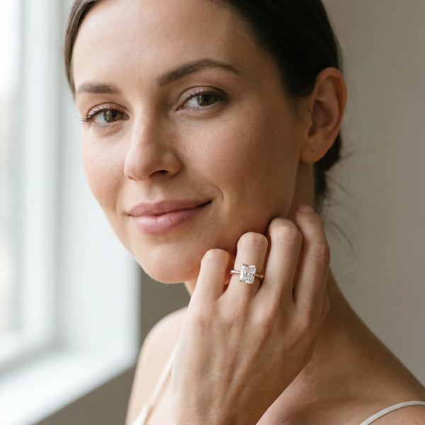 Rose gold Radiant Solitaire Diamond Ring with Bamboo Band and Four-Prong Setting