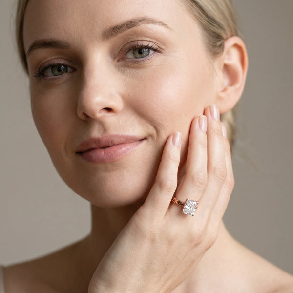 Rose gold Radiant Solitaire Engagement Ring with Scrollwork Band and Four-Prong Setting