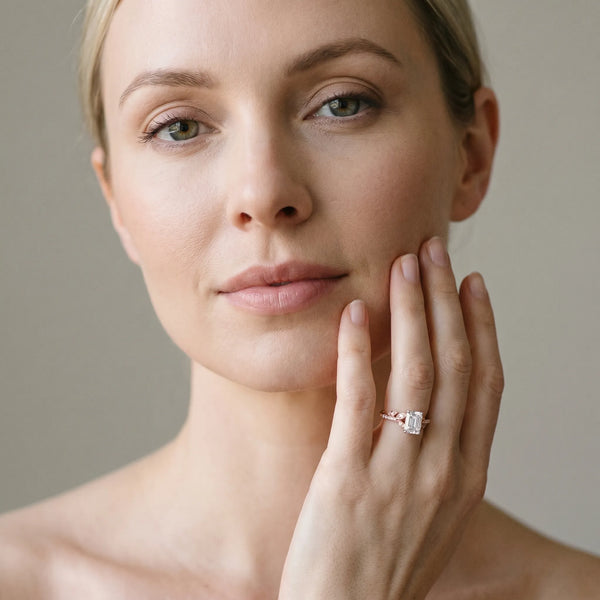 Rose gold Radiant Solitaire Leaf-Inspired Diamond Ring with Pavé Band and Four-Prong Setting
