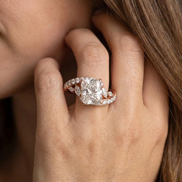 Rose gold Radiant Solitaire with Pavé Twist Band and Four-Prong Setting