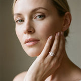 Rose gold Radiant Solitaire with Tapered Baguette Side Stones on a Classic Band with Four-Prong Setting_14