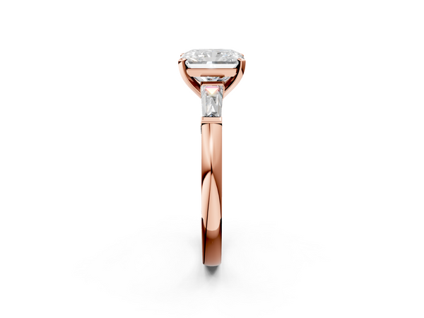Rose gold Radiant Solitaire with Tapered Baguette Side Stones on a Classic Band with Four-Prong Setting