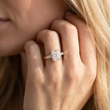 Rose gold Radiant Solitaire with Tapered Baguette Side Stones on a Classic Band with Four-Prong Setting_15