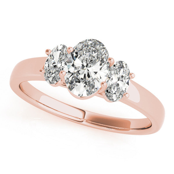 Rose gold Radiant Three-Stone Diamond Ring with Prong Setting on a Classic Band 1