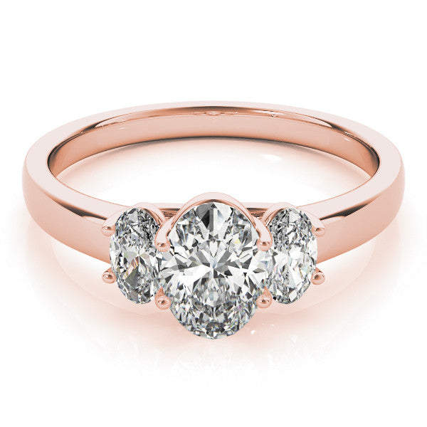 Rose gold Heart Three-Stone Diamond Ring with Prong Setting on a Classic Band