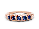 Rose gold Round Blue Sapphire Eternity Band with Twist Prong Setting_6