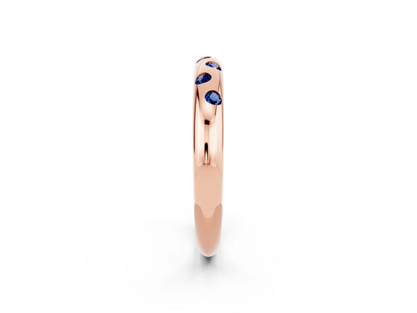 Rose Gold Round Lab-Grown Blue Sapphire Flush Set Domed Wedding Band with Staggered Stones