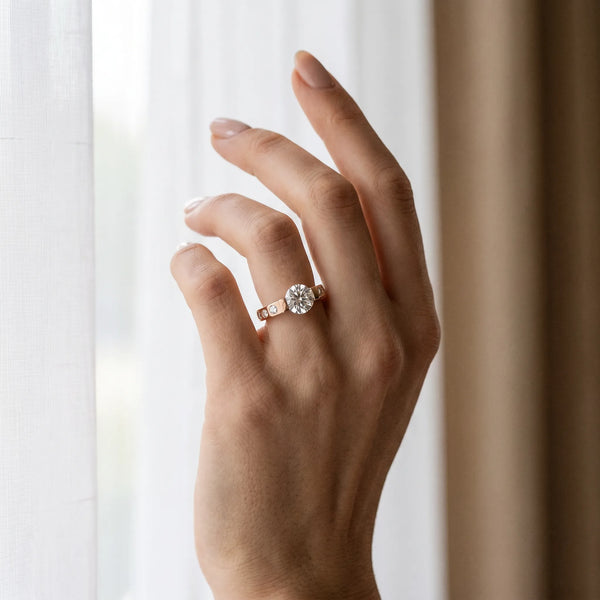 Rose gold Round Brilliant Channel-Set Diamond Ring with Bezel Prong Setting