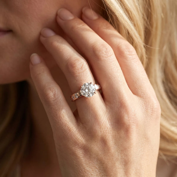 Rose gold Round Brilliant Channel-Set Diamond Ring with Bezel Prong Setting