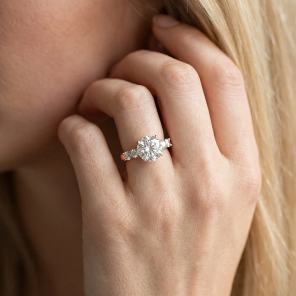 Rose gold Round Brilliant Cut Diamond Five-Stone Prong Set Engagement Ring with Channel Band