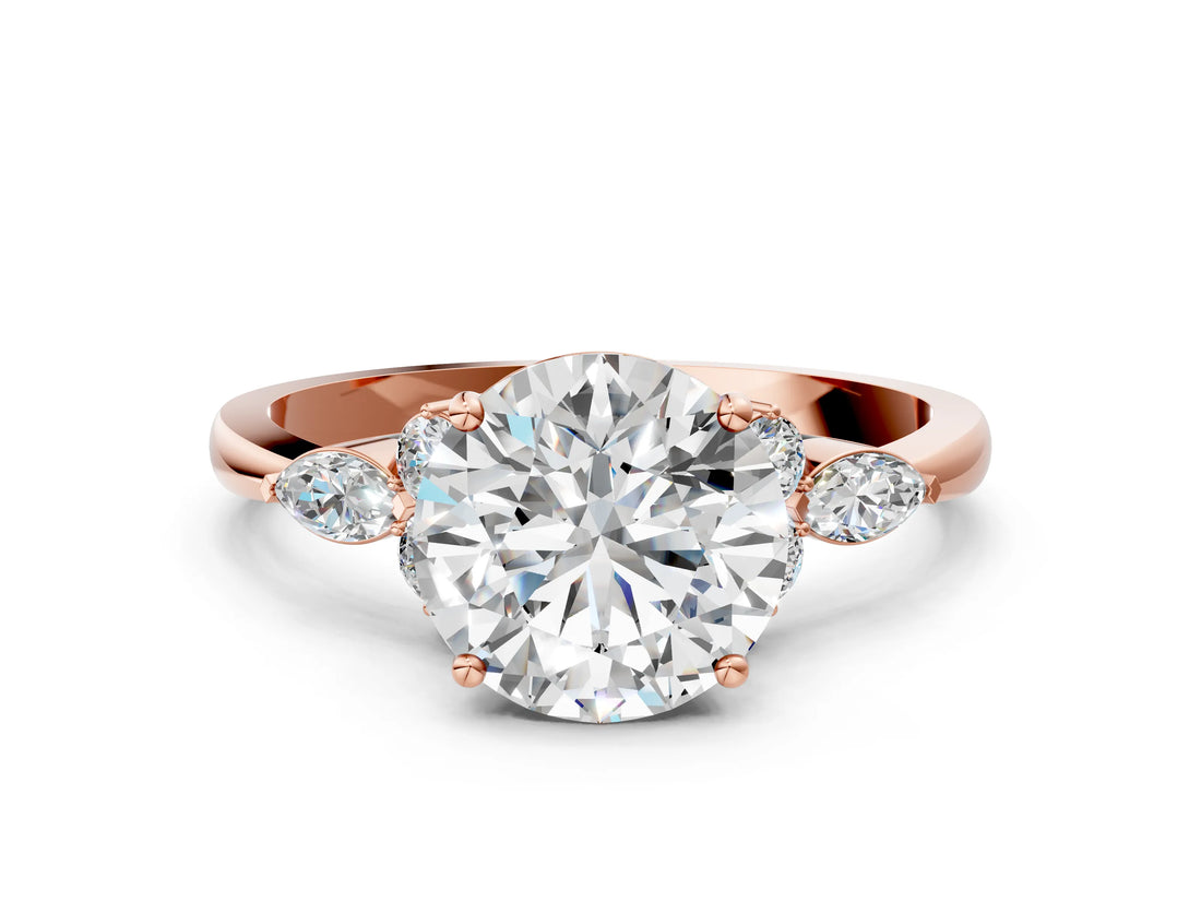 Rose gold Round Brilliant Diamond Solitaire Ring with Pear Side Stones and Four-Prong Setting_10