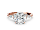Rose gold Round Brilliant Diamond Solitaire Ring with Pear Side Stones and Four-Prong Setting_10