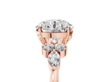 Rose gold Round Brilliant Diamond Solitaire Ring with Pear Side Stones and Four-Prong Setting_15