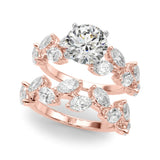 Rose gold Round Brilliant Diamond Solitaire with Marquise and Pear Accent Stones on a Split Shank Band with Four-Prong Setting 1