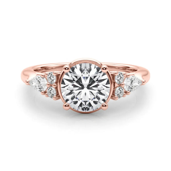 Rose gold Round Brilliant Diamond Solitaire with Side Stones on a Tapered Band and Four-Prong Setting
