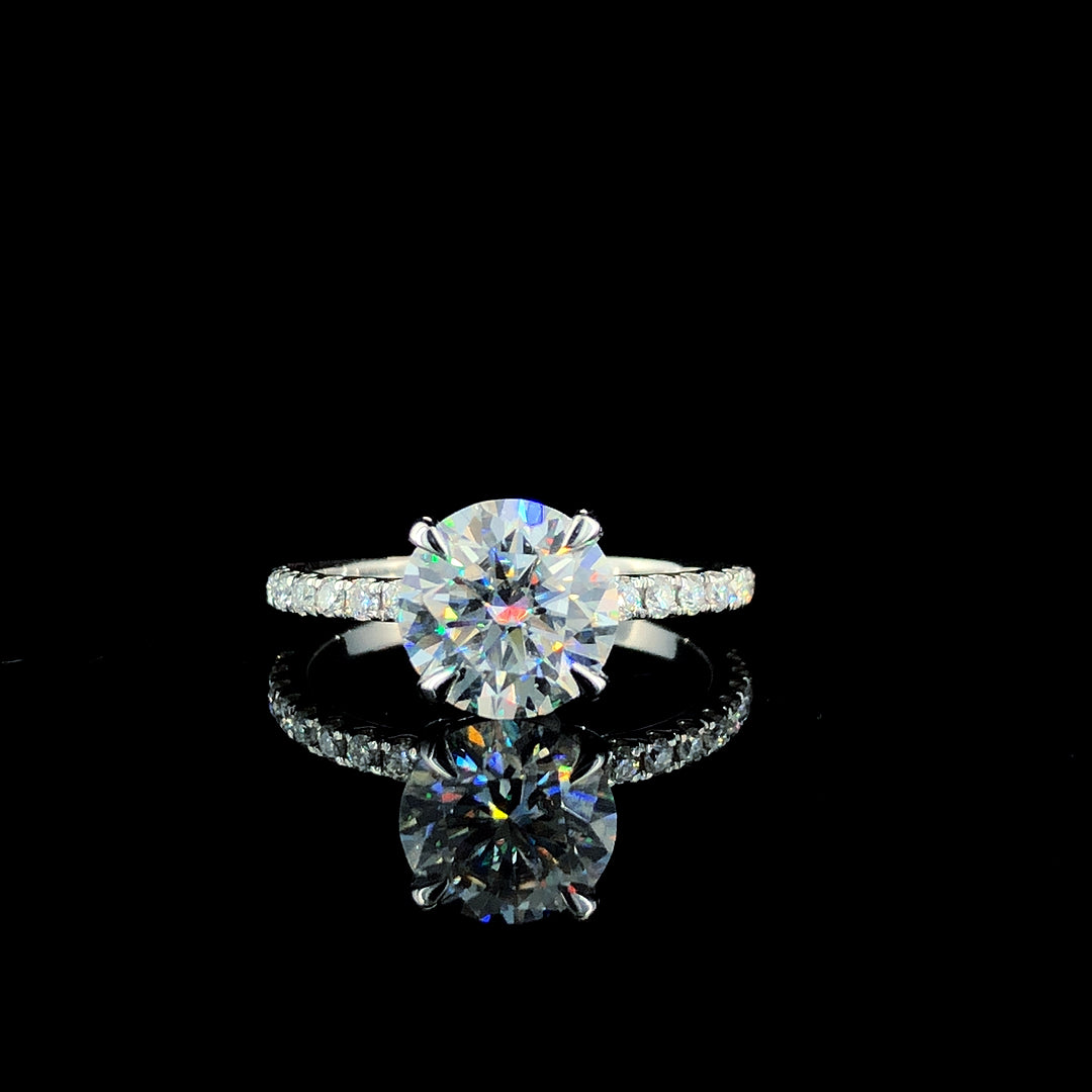 Rose gold Round Brilliant Solitaire with Pavé Band and Four-Prong Setting 1