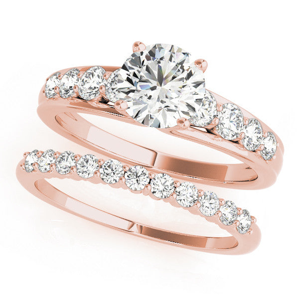 Rose gold Round Brilliant Solitaire with Side Stones on a Pave Band and Four-Prong Setting