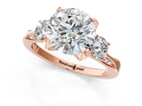 Rose gold Round Brilliant Three-Stone Diamond Ring with Pavé Band and Four-Prong Setting_7