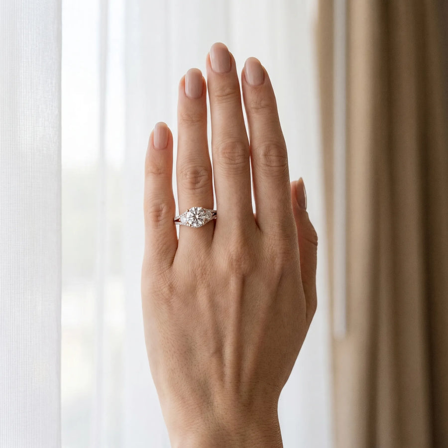 Rose gold Round Brilliant Three-Stone Diamond Ring with Pavé Band and Prong Setting