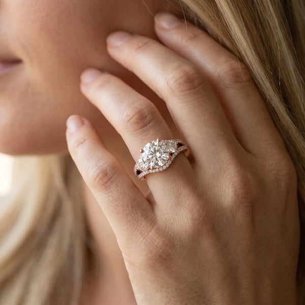 Rose gold Round Brilliant Three-Stone Diamond Ring with Pavé Band and Prong Setting