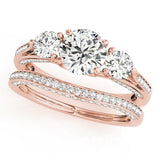 Rose gold Round Brilliant Three-Stone Engagement Ring with Split Shank and Prong Setting 1