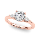 Rose gold Round Brilliant Three-Stone Ring with Pear Side Stones and Four-Prong Setting