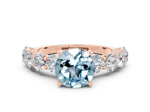 Rose gold Round Cut Aquamarine Prong Setting with Side Stones on a Pave Band