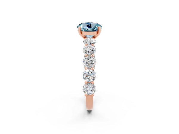 Rose gold Round Cut Aquamarine Prong Setting with Side Stones on a Pave Band